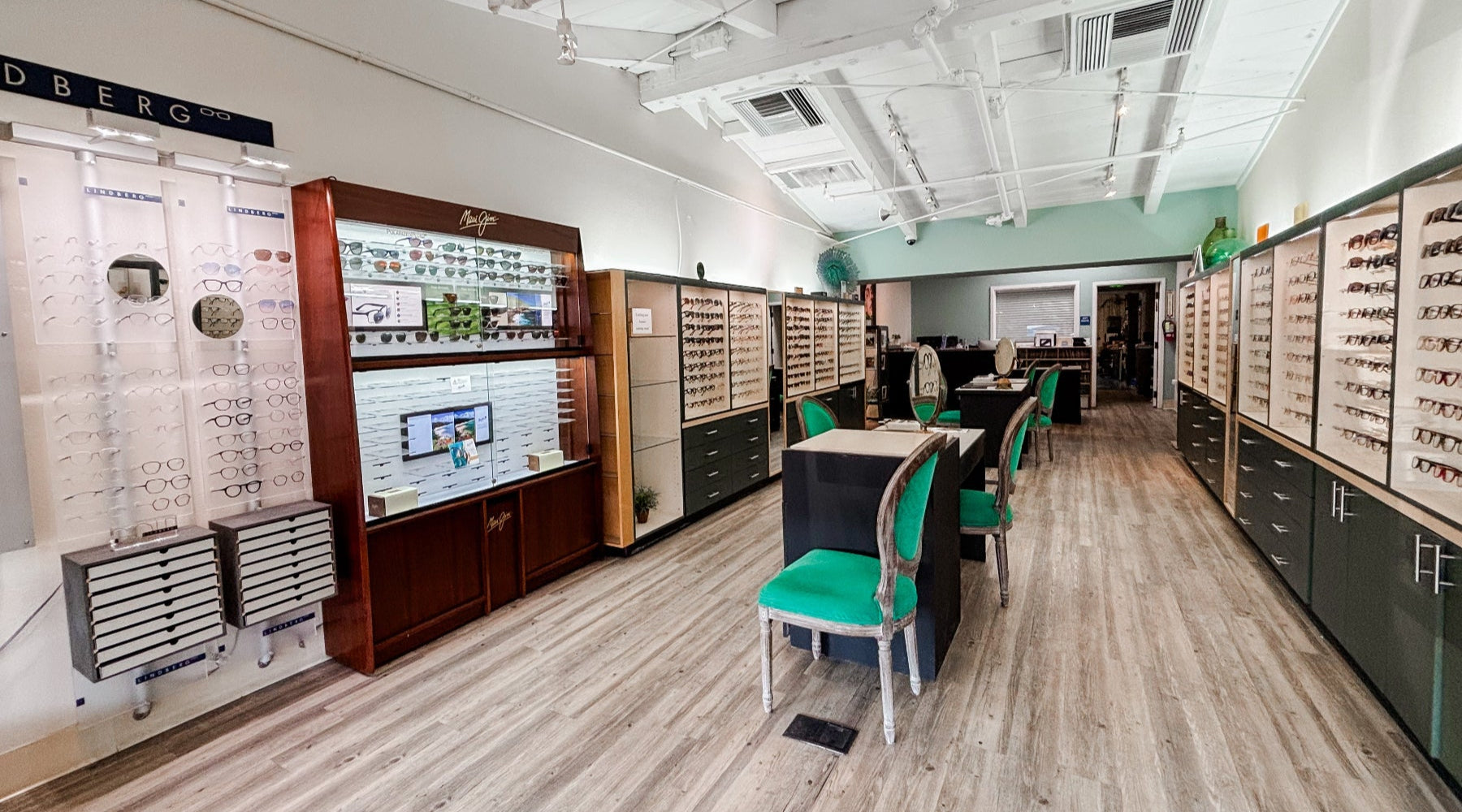 Inside Wilby Optical by Alexander Daas showing displays of eyeglasses and sunglasses.